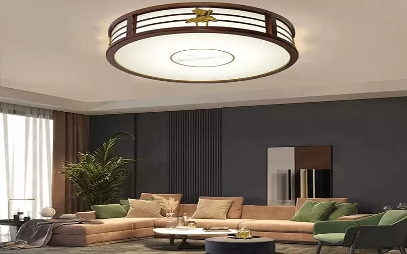 Den-trang-tri-phong-khach-tran-go-hinh-tron-truyen-thong